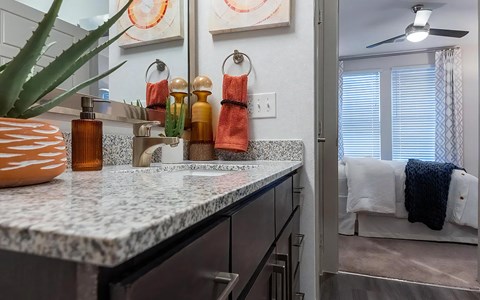 a kitchen with a granite counter top and a sink