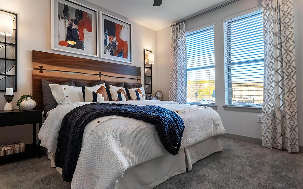 Well-Lit Bedroom Featuring Modern Décor and Ample Natural Light