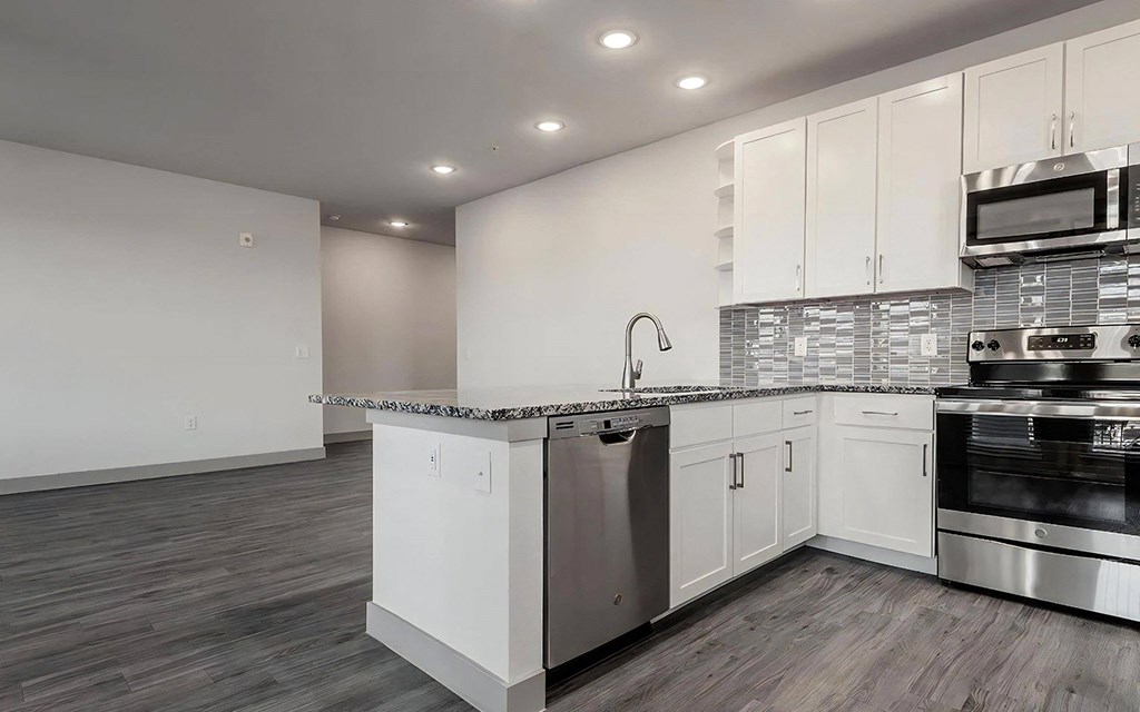 Bright Open-Concept Kitchen with Large Island and Modern Fixtures