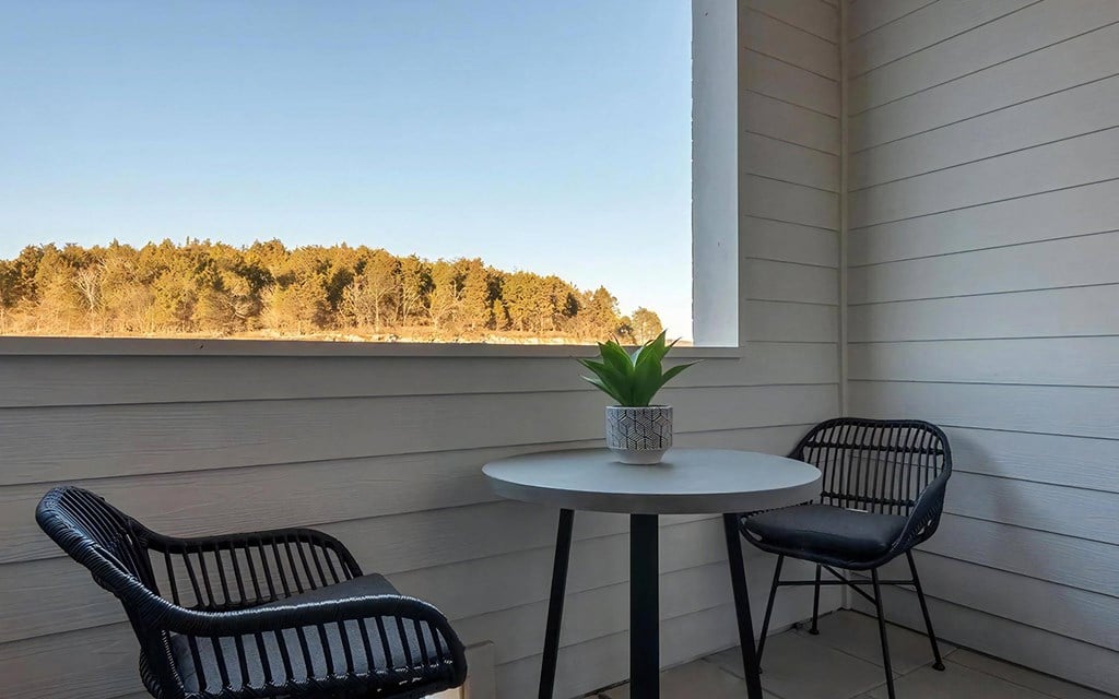 Private Apartment Patio with Outdoor Seating and Scenic Views