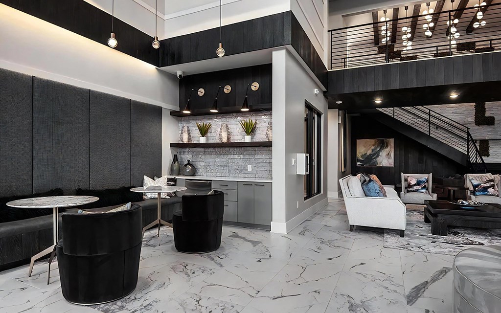 Community Lounge Featuring High Ceilings and Marble Floors