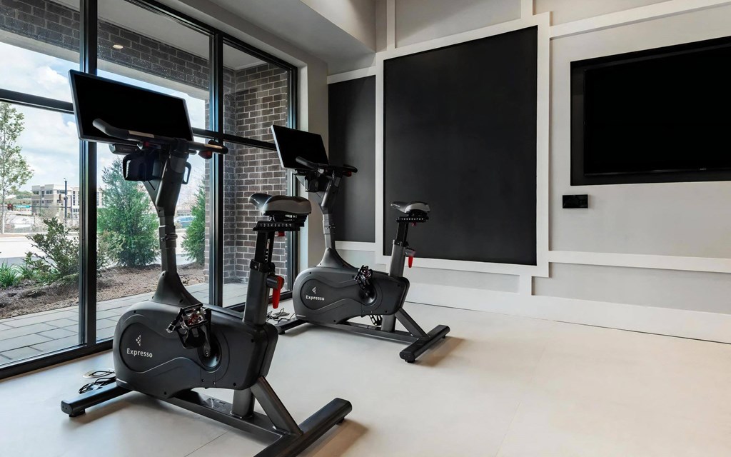 Private Spin Corner with Fitness Bikes and Wall-Mounted Screens