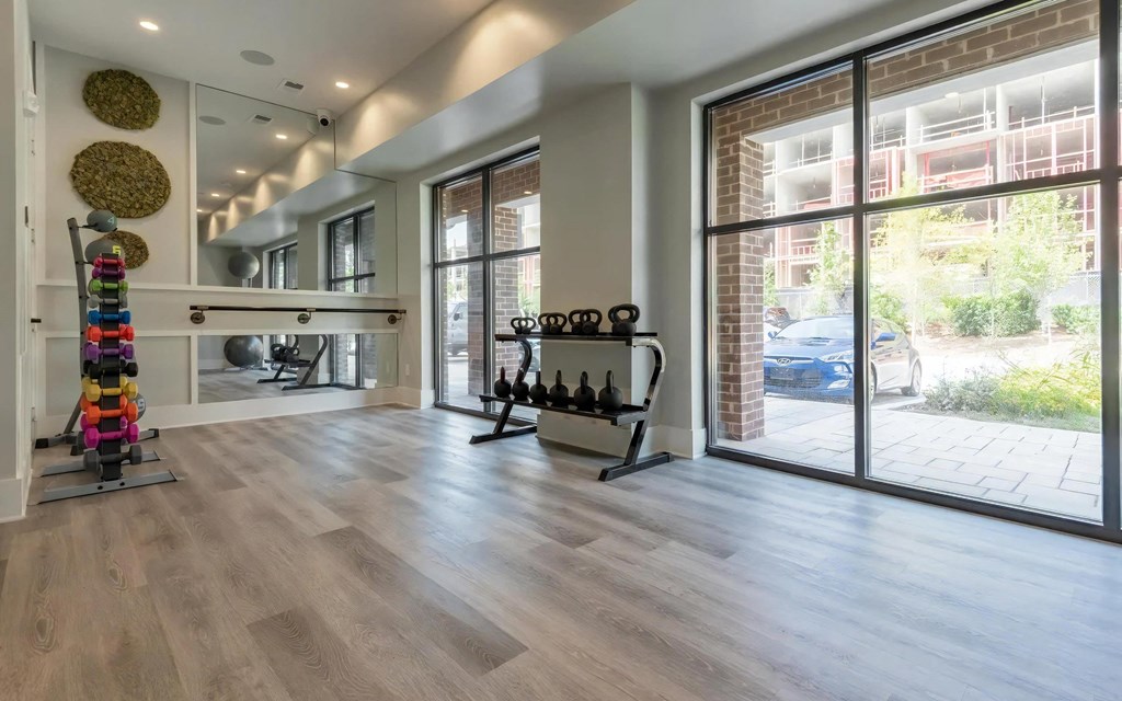Open Exercise Space with Natural Light and Strength Equipment