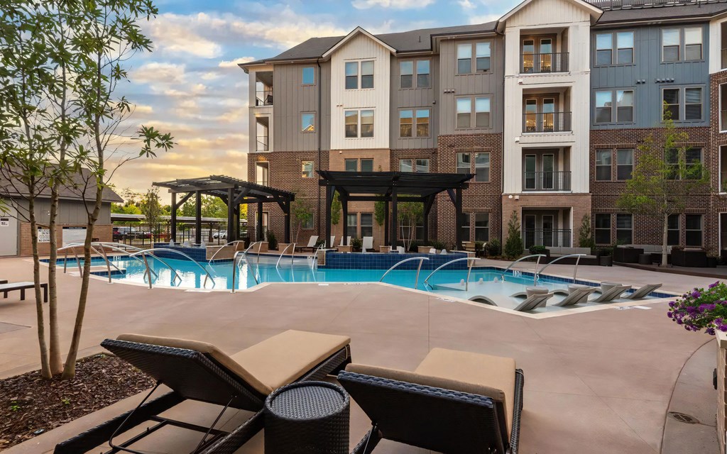 Relax Beside the Pool with In-Water Seating and Sundeck Access