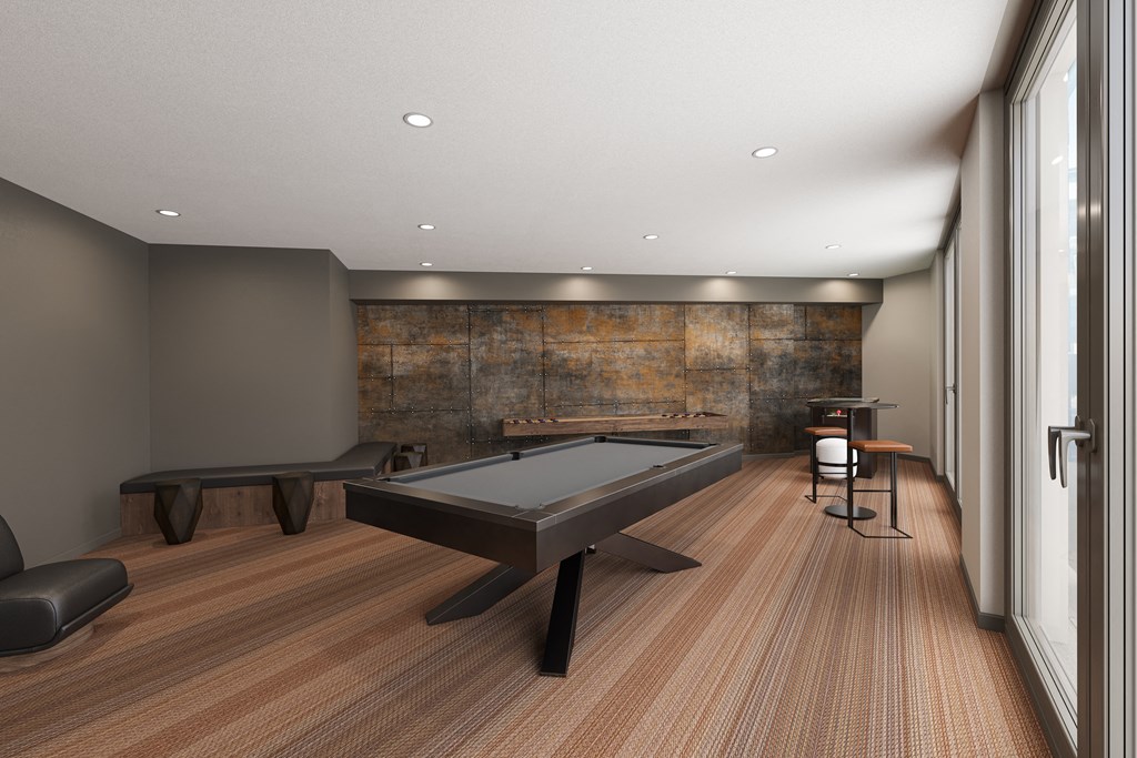 a game room with a pool table and a piano