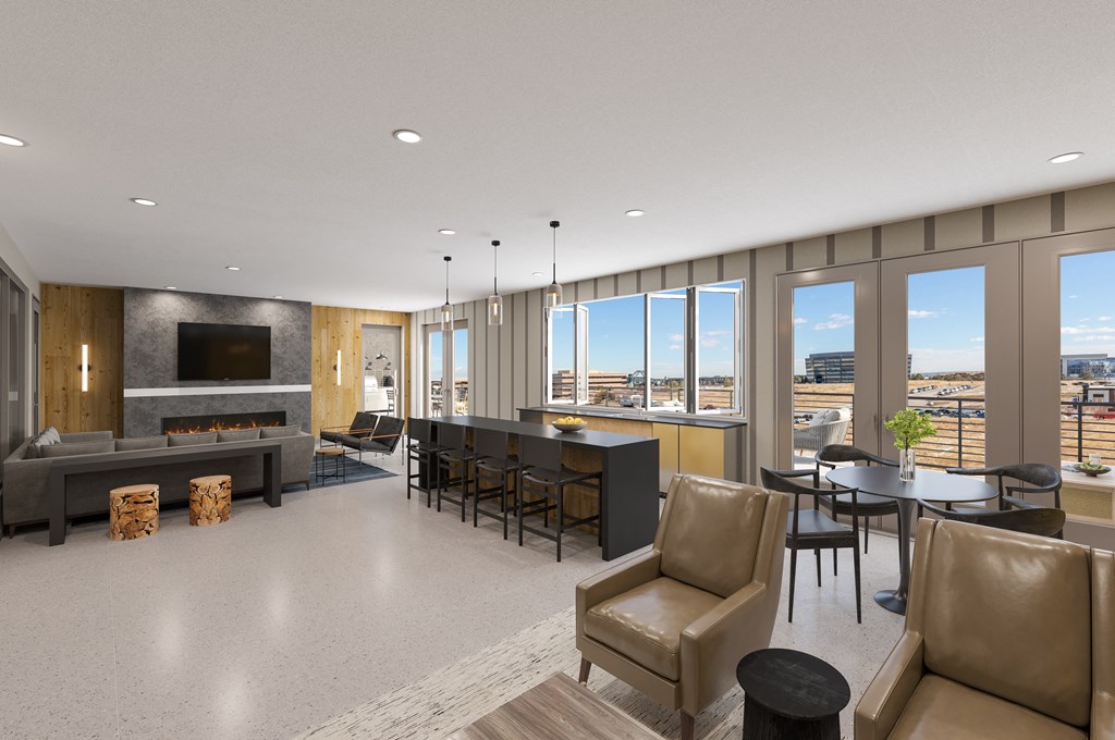 a living room with a table and chairs and a fireplace