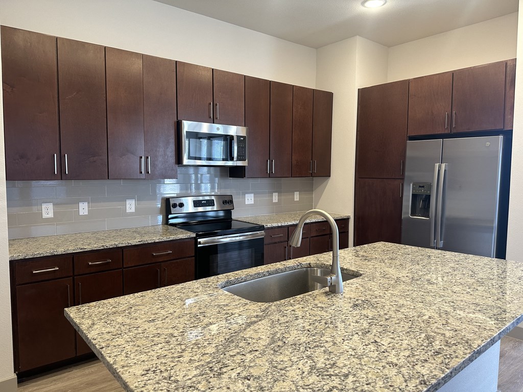 Large Kitchen with Stainless Steel Appliances
