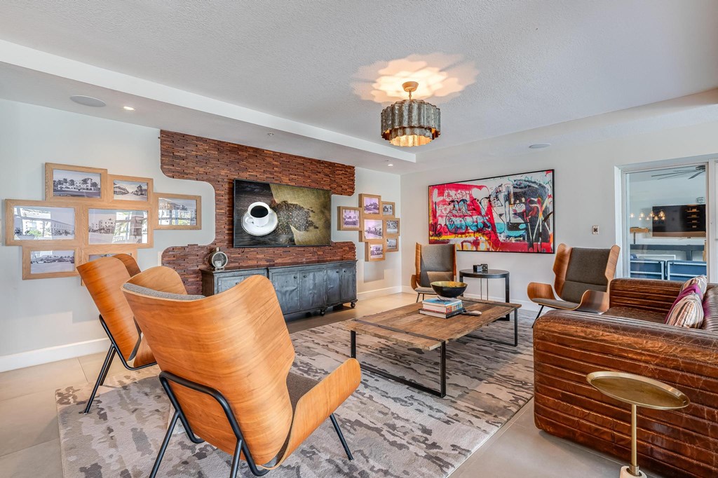 Kitchen Island with Wine Setup and View of Living Room and Balcony