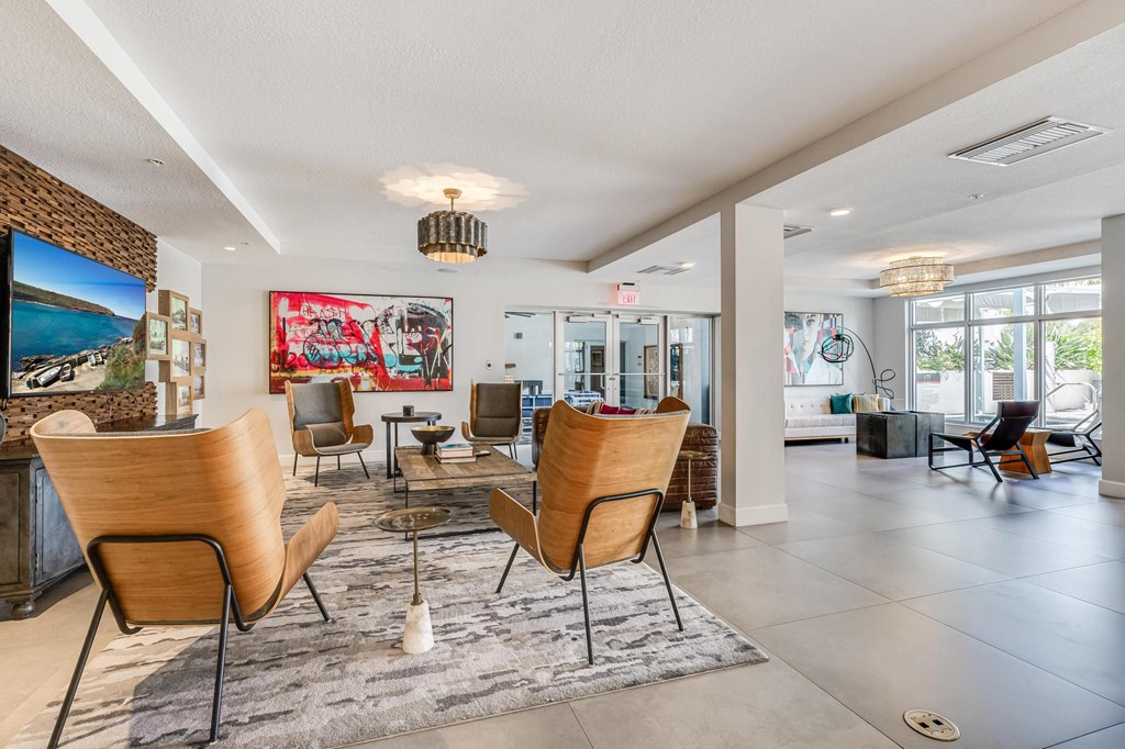 Resident Gathering Lounge with Lounge Chairs and Clubroom Access