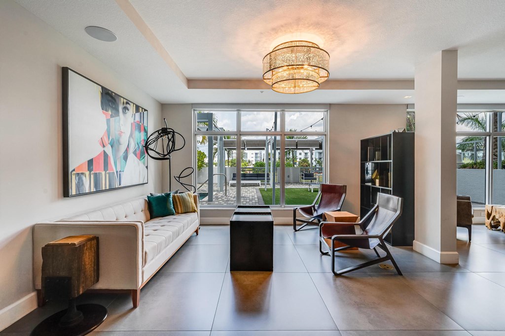 Lounge Seating with Sofa, Accent Chairs, and Large Windows