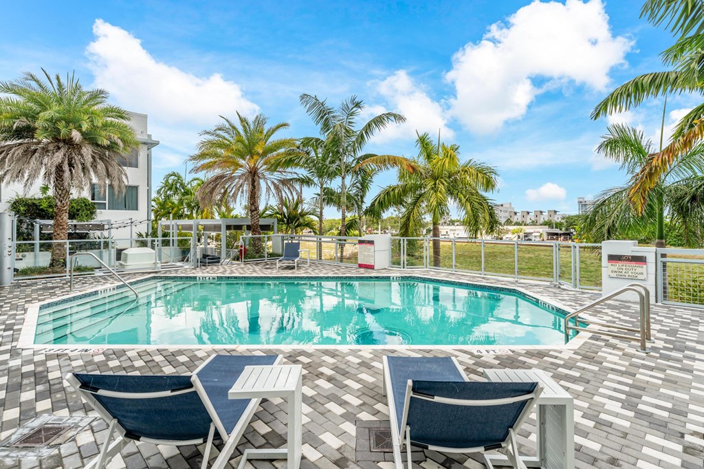 Compact Workspace Featuring Pendant Lighting and Two Workstations