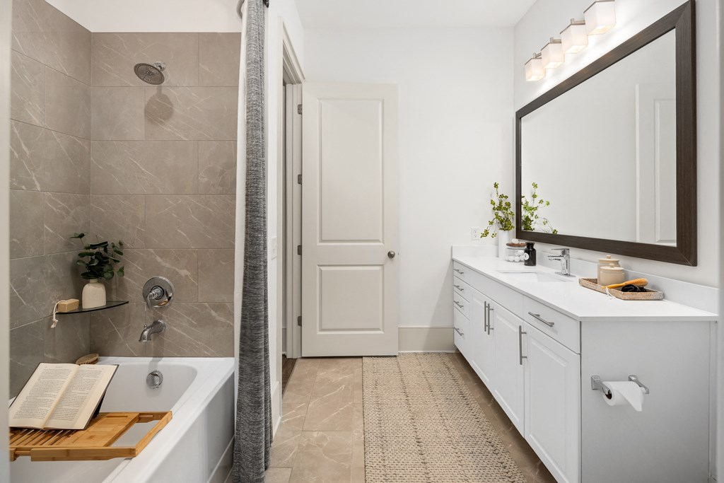 Full Bathroom Featuring Tub and Shower Combo with Curtain and Vanity