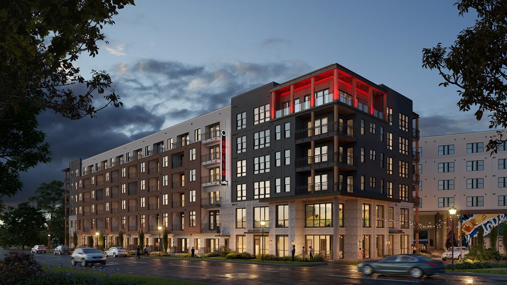 a rendering of an apartment building at dusk