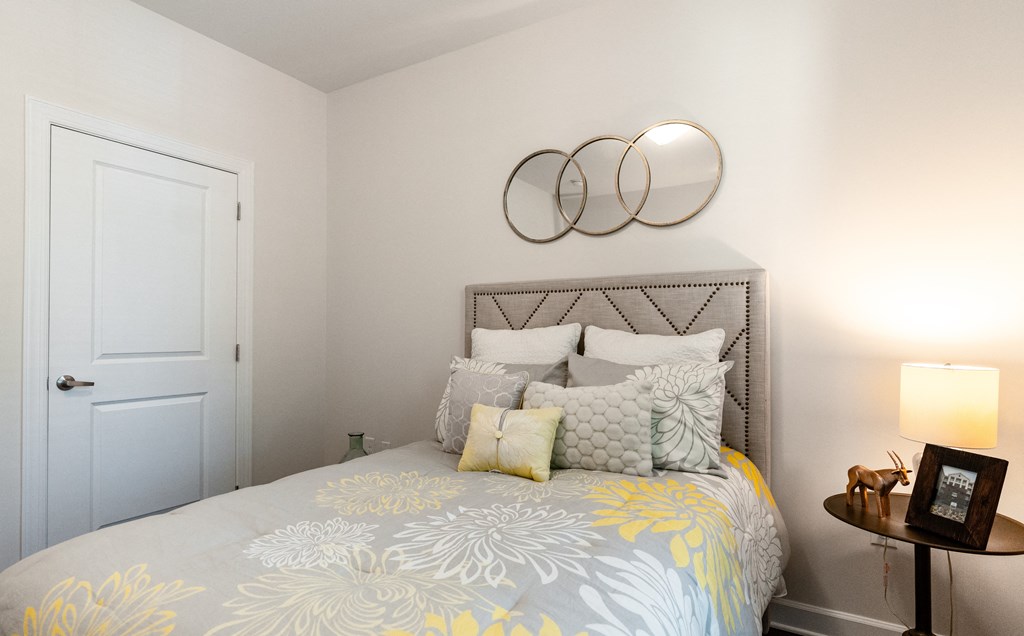 Stylish Apartment Bedroom Featuring Modern Decor and Soft Lighting