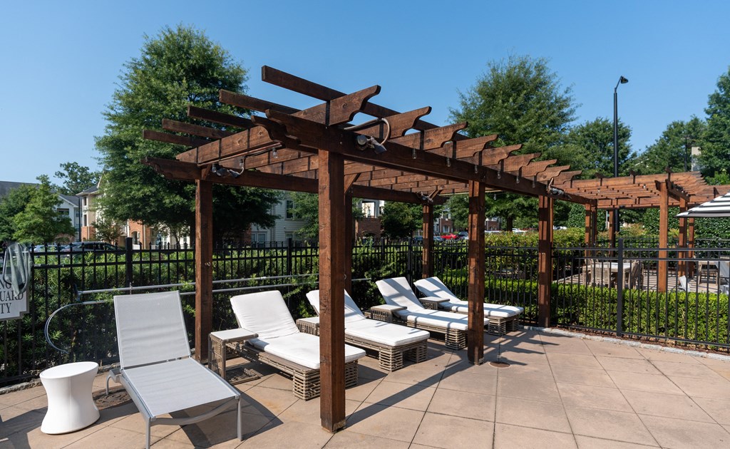Relaxing Cabana Lounge with Sun Chairs and Natural Wood Structures
