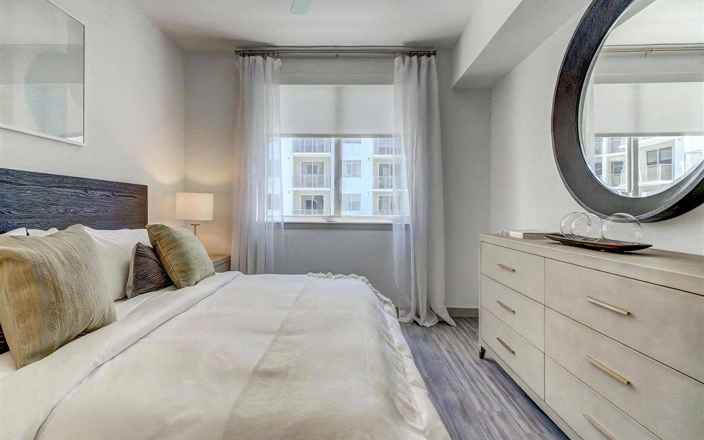 Spacious Bedroom with Wood Style Flooring