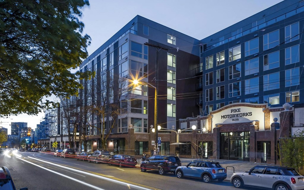 Pike Motorworks Building Exterior Facing Street with Night Lighting