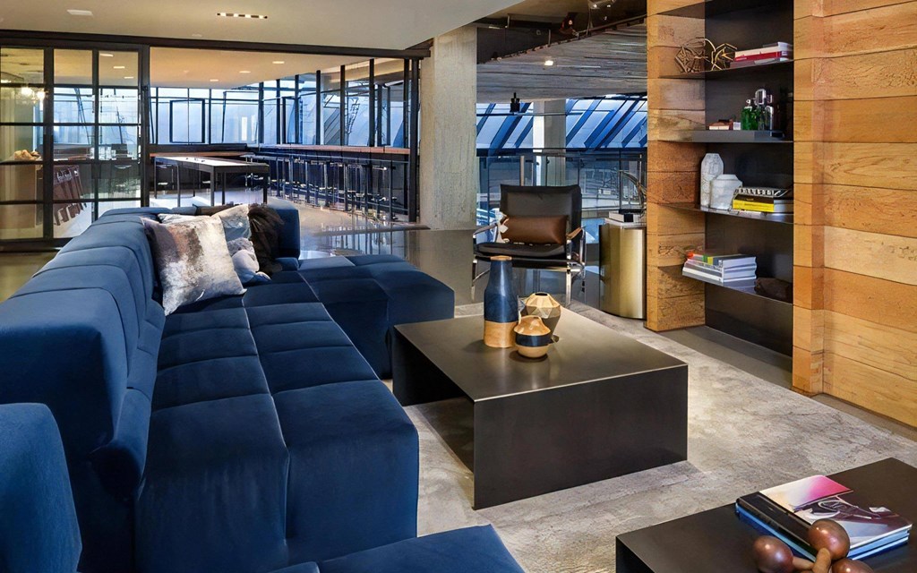 Indoor Lounge Space with Built-In Shelving and Shared Seating Options