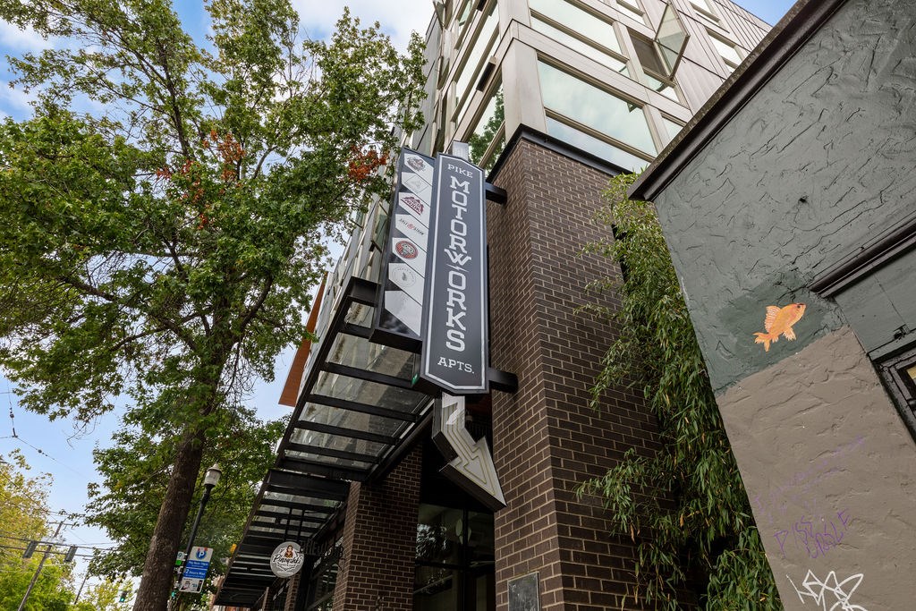 A sign for a restaurant named "Mother's" hangs above the entrance.