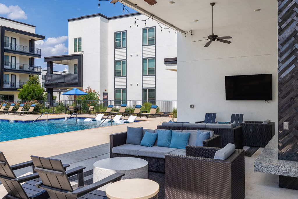 Rhythm Covered Pool Area with Outdoor TV and Seating