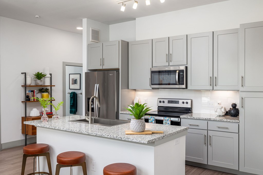 High-End Kitchen with Granite Counters and Stainless Steel Appliances