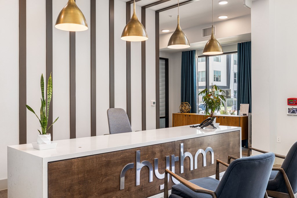 Rhythm Leasing Office with gold lighting
