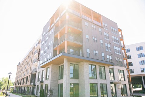 a large building with a street in front of it