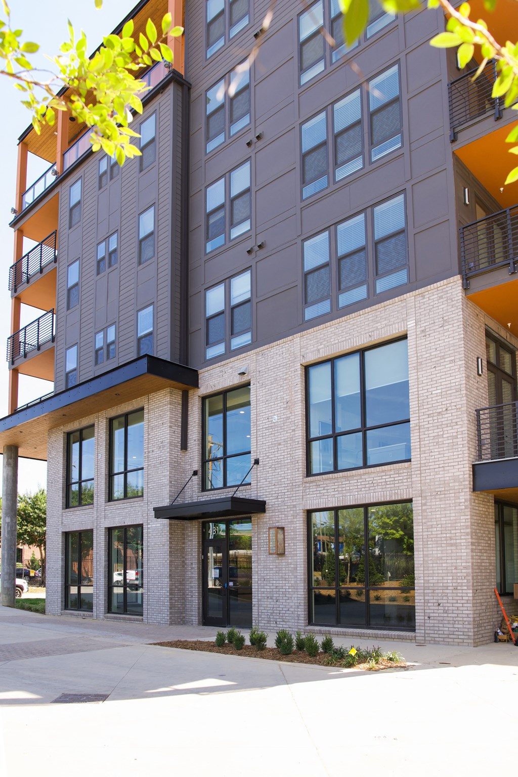 a rendering of the exterior of a new apartment building