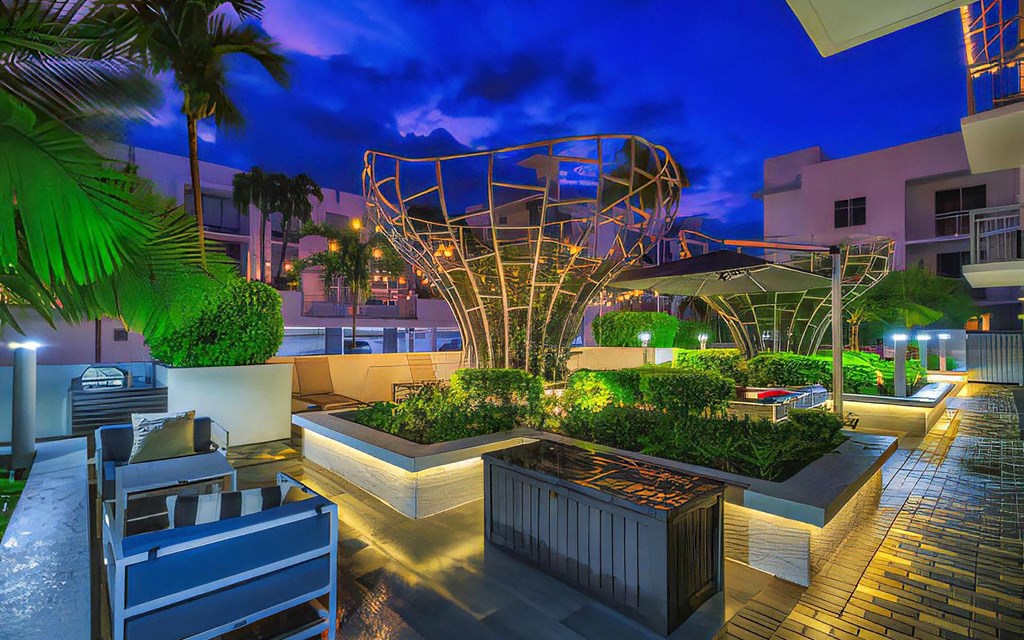 Evening Courtyard Lounge with Sculptural Lighting at South of Atlantic