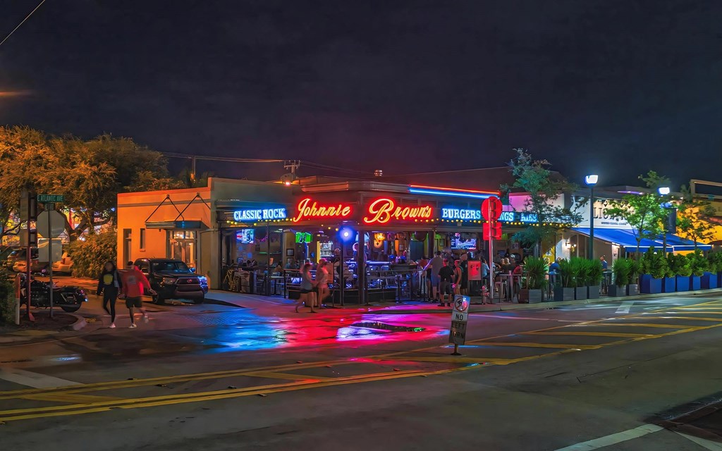 High-Energy Night Scene Featuring Music and Burgers at Johnnie Brown’s