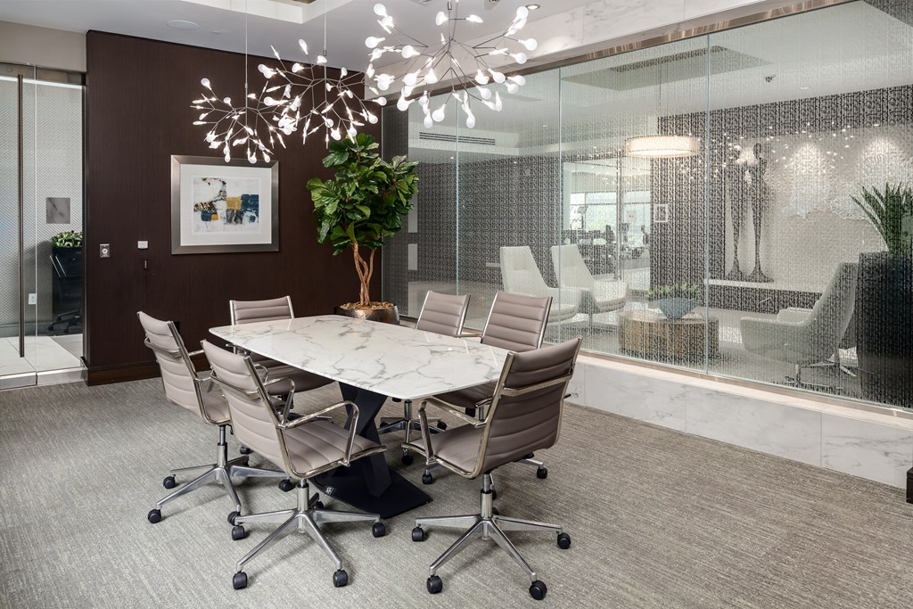 Elegant Business Meeting Room with Designer Chairs and Marble Top Table