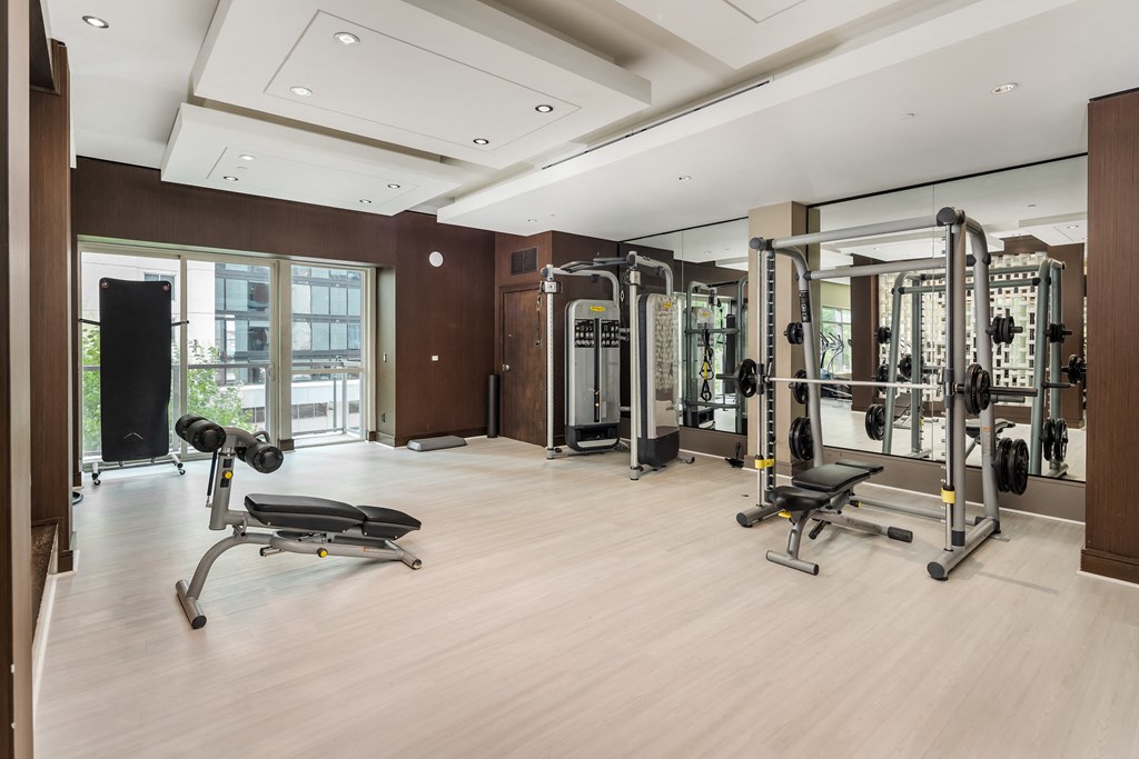 Mirror-Walled Strength Studio with Top-of-the-Line Gym Equipment