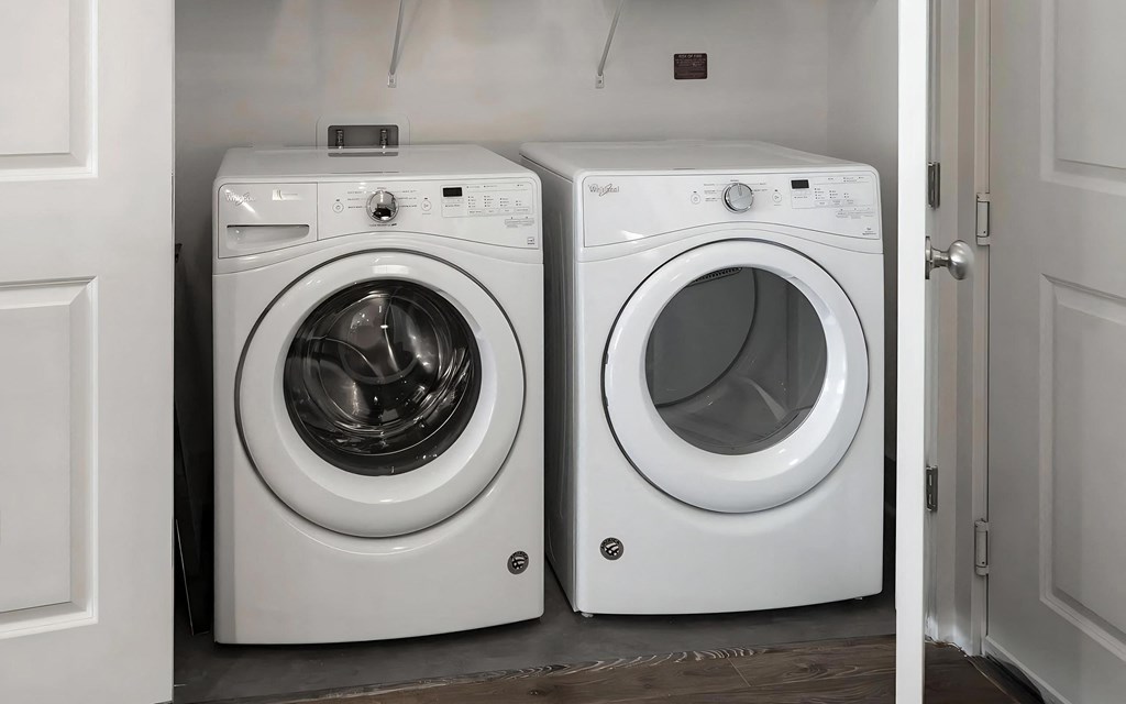 Side-by-Side Front-Loading Laundry Machines in Apartment Unit