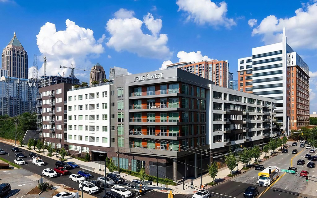 Apartment Building With Tens on West Sign and Midtown Background