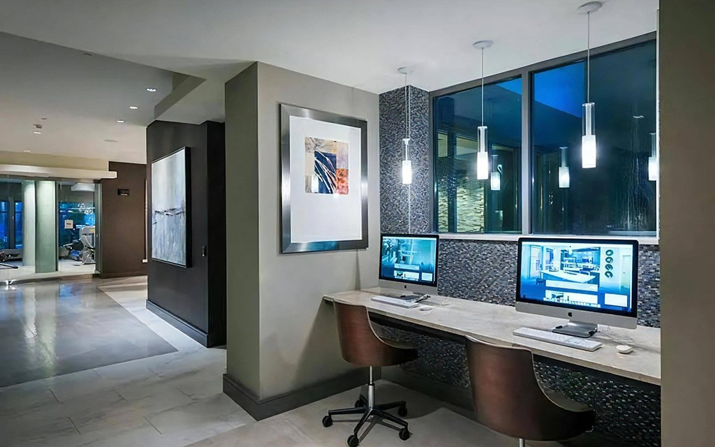 Business Center With Workstations and Pendant Lighting in Clubhouse