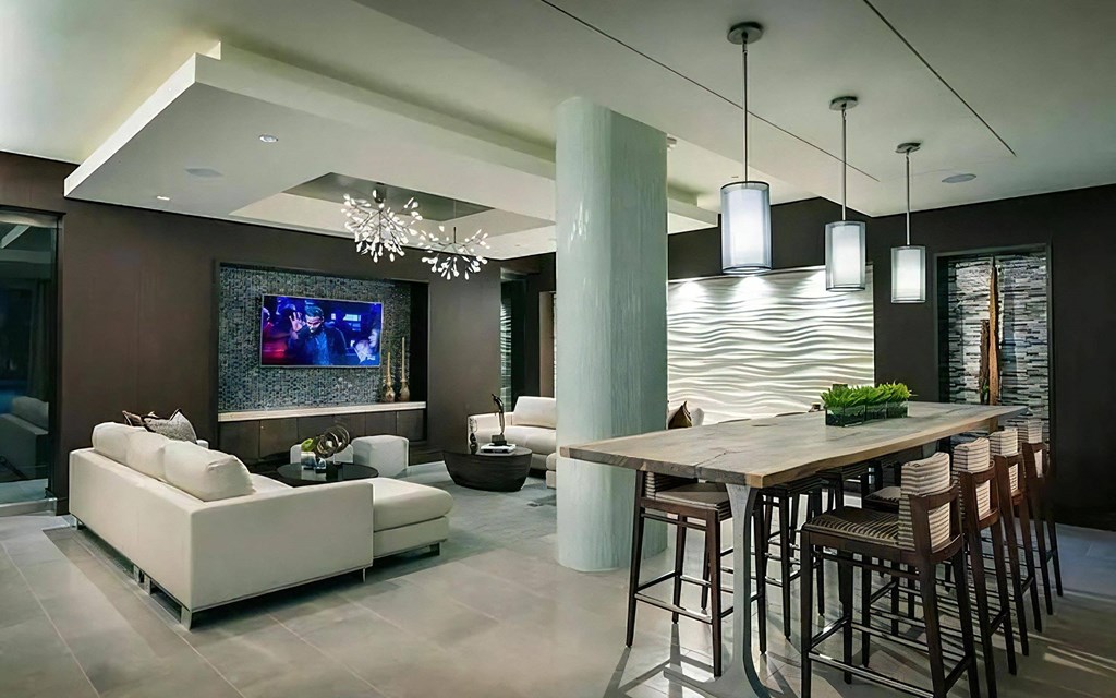 Clubhouse Lounge With Sofa Seating and Bar-Height Dining Table
