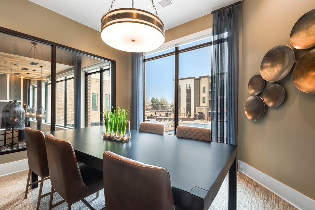 Sleek Private Office Space with Floor-to-Ceiling Windows and Stylish Decor