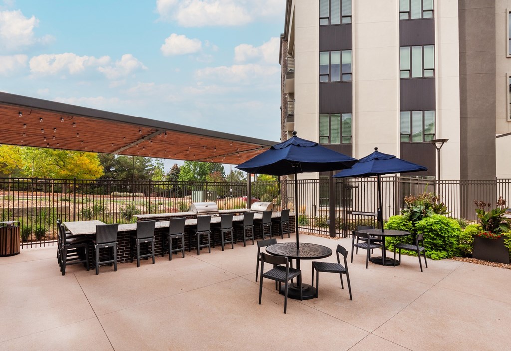 Expansive Poolside Patio With Grills