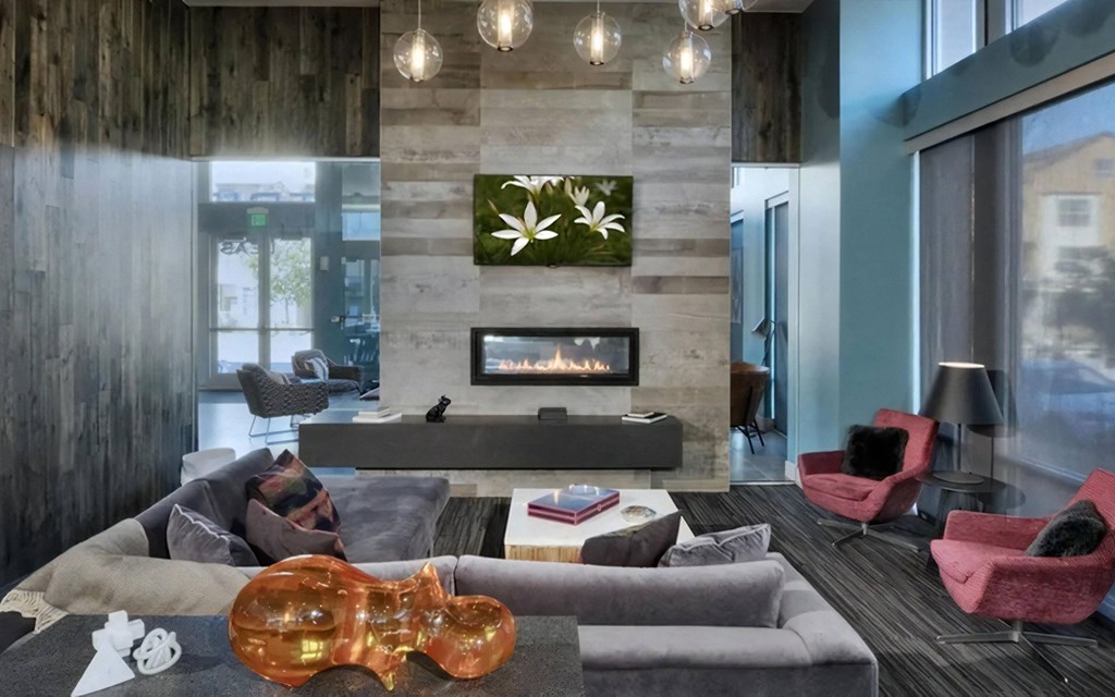 Indoor Lounge with Fireplace and TV