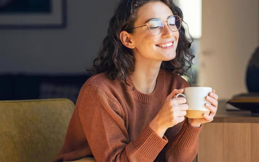 Woman Smiling Sitting Inside
