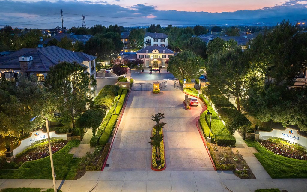 Gated Entrance to Complex in Evening