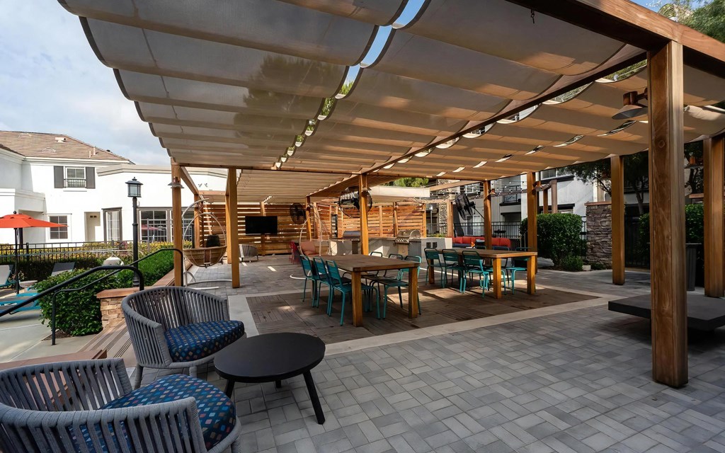 Covered Patio with Tables and Grills