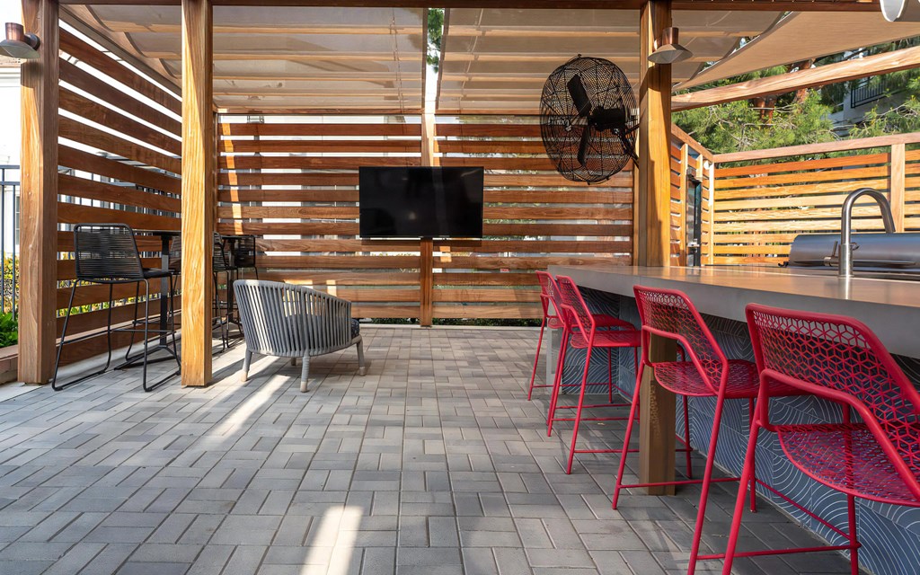 Outdoor Kitchen with Grills and TV