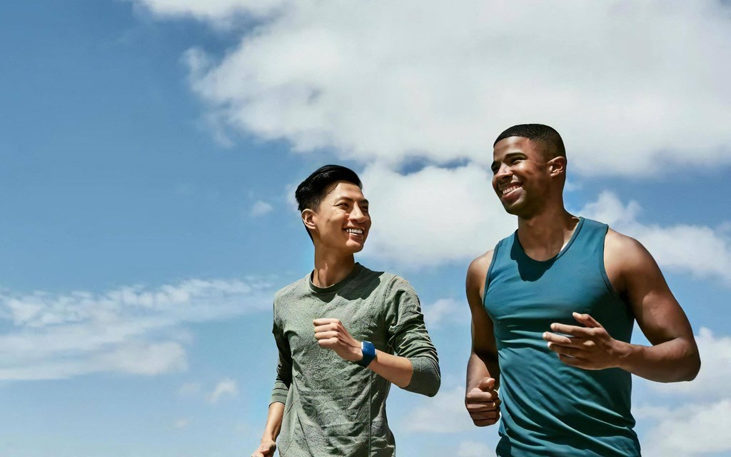 Two Friends Running Outside