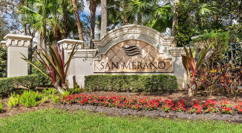 A sign that says Sammerano in front of some plants.