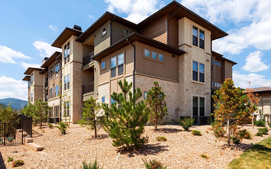 Westerly Apartments With Scenic Mountain Backdrop And Desert Landscaping