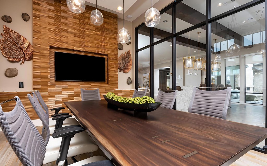 Clubhouse Meeting Space with Large Table and Smart TV Clubhouse Meeting Space with Large Table and Smart TV