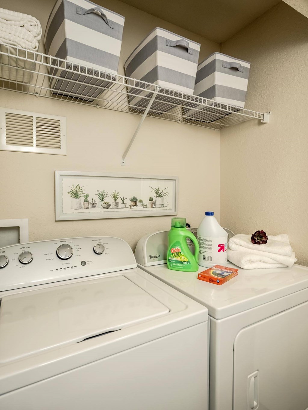 In-home washer and dryer with overhead storage shelf