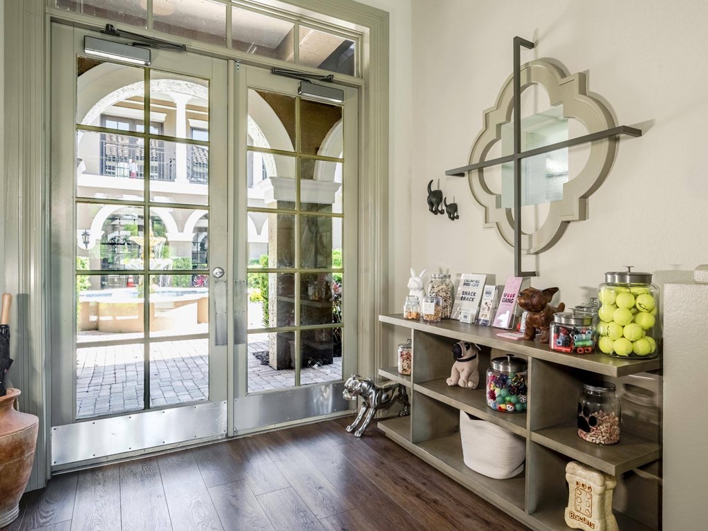 Pet-friendly amenity station offering treats, toys, and essentials for residents’ furry friends.