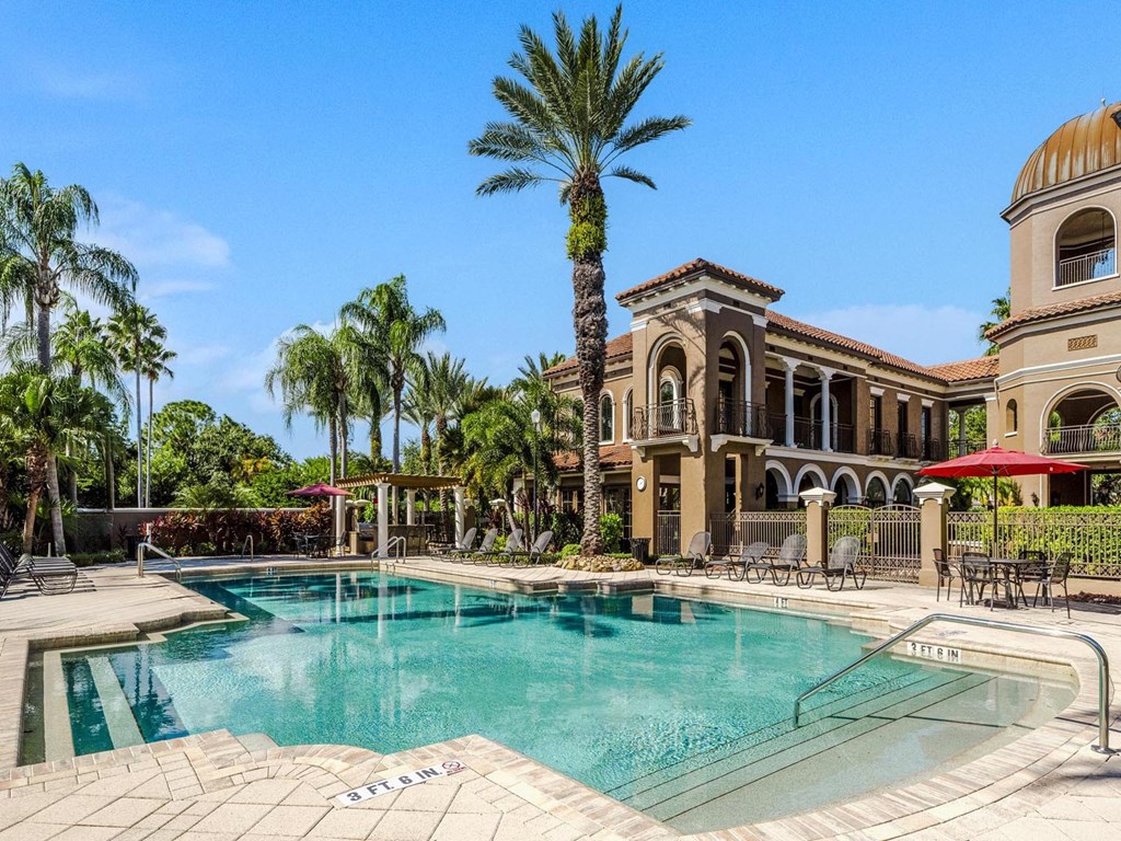 Resort pool with palm trees and Mediterranean architecture in St. Petersburg, Florida